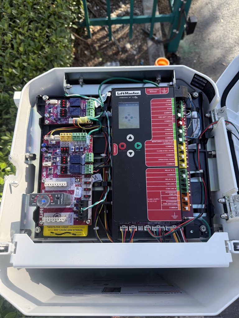 Open LiftMaster gate operator control board during service